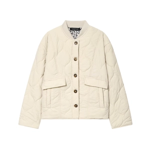 Quilted beige jacket with snap buttons, front pockets, and leopard print collar detail