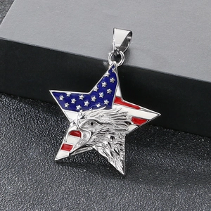 Macro shot of stainless steel eagle pendant with US flag enamel stars and stripes