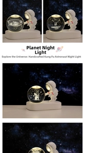 Detail of 3D laser engraved crystal ball night light with astronaut stand and solar system