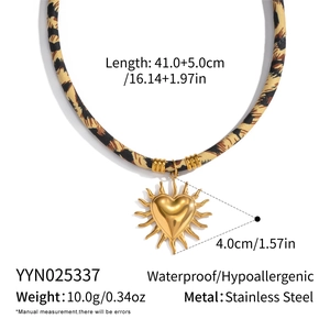Detail of leopard print scarf necklace with golden sun heart pendant and dimensions