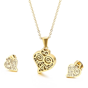 Golden heart-shaped hollow pendant necklace and stud earrings set with spiral texture