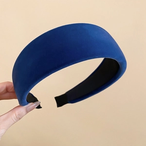 Detailed texture of thick navy velvet padded headband with anti-slip inner lining