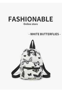 Detailed view of fashionable canvas backpack featuring aesthetic black butterfly patterns