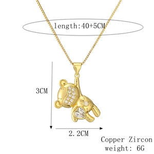 Detail of bear pendant showing 40+5cm length and 2.2x3cm copper zircon dimensions