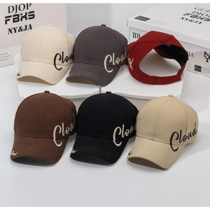 Detail of multi-color sun visors with Cloud embroidery and ponytail opening design