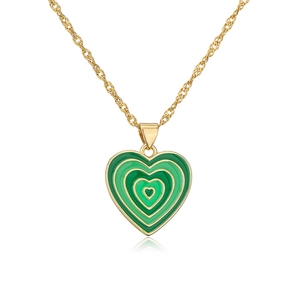 Detailed view of 18K gold-plated twisted chain necklace with green enamel heart pendant