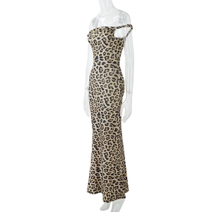 Detail shot of leopard print pattern and slim fit bodycon design on a long dress