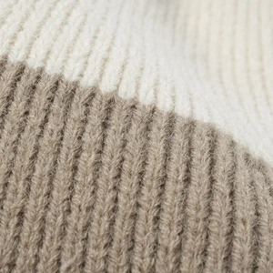 Women's warm knit beanie featuring a beige and camel color block ribbed texture design