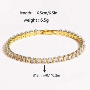 Detail view of gold teardrop zircon bracelet with dimensions 16.5cm length and 6.5g weight