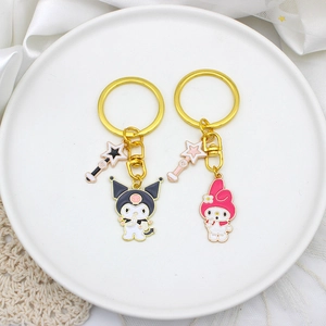 Detail of gold lobster clasps and keyrings featuring Kuromi and My Melody character charms