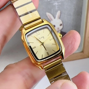 Elegant gold square dial watch for women with stylish metal link bracelet and Roman numerals