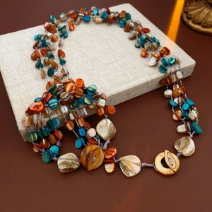 Bohemian multi-layer irregular shell necklace with woven cord and large round buckle