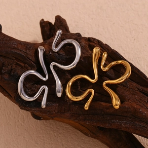 Minimalist irregular liquid wave ear clips in gold and silver stainless steel finish