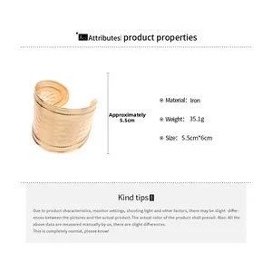 Detailed view of wide golden iron cuff bracelet with hammer texture and 5.5cm height