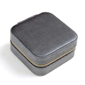 Grey velvet jewelry travel case with gold zipper for rings and earrings storage