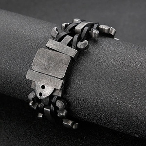 Retro mens wide stainless steel bracelet with black leather cord in punk motor style
