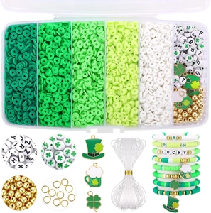 Macro detail of St. Patrick's Day DIY kit with green clay beads and lucky pendants