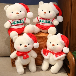 Set of 4 cute Christmas teddy bears in festive outfits with hats and scarves in a basket