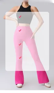 Close-up of pink flared yoga pants showing high-waisted stitching and elastic fabric