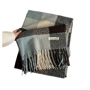 Autumn plaid tassel scarf with soft knit texture in grey and blue patchwork style