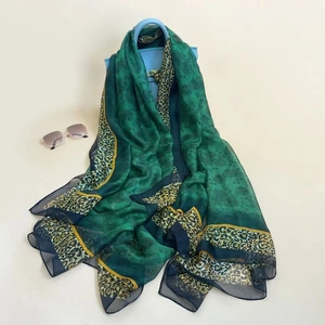 Elegant dark green chiffon long scarf with leopard print borders and subtle patterns