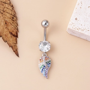 Silver belly button ring with butterfly wings and rainbow zircon pendant on a stone