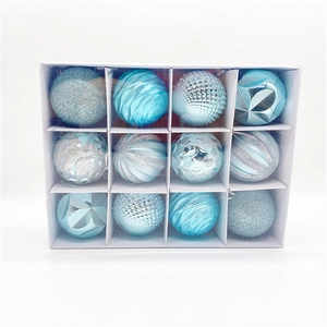 Set of 12 light blue and silver Christmas ornaments with assorted glitter textures in a box