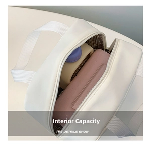 Detail view of the insulated interior showing thermal foil lining and food storage capacity