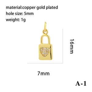 Detail view of 18K gold plated heart lock pendant with white zircon pavé and 5mm hole size