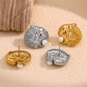 Elegant 18K gold and silver sea shell starfish stud earrings with pearls on sand