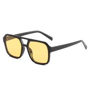 Vintage square double-bridge sunglasses with black frame and yellow tinted lenses