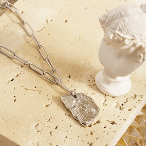 French vintage silver necklace with irregular portrait pendant and pearl on stone
