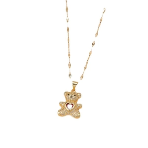 Golden titanium steel teddy bear necklace with red heart and sparkling cubic zirconia