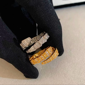 Luxurious snake-shaped open rings in gold and silver finish with sparkling zircon stones