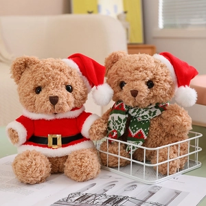 Plush Christmas teddy bears in Santa outfits and festive scarves for holiday decor