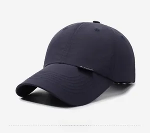 Detailed side view of navy blue breathable quick-dry baseball cap with curved brim