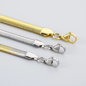 Flat snake bone necklaces in gold, silver and two-tone finishes with lobster clasps
