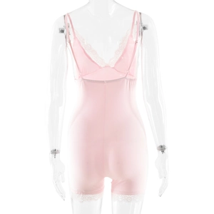 Detailed back view of pink bodysuit featuring delicate white lace trim and thin straps