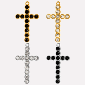 Cross pendants in gold and silver finish featuring black and clear inlaid gemstones