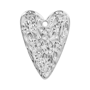 Macro detail of silver 304 stainless steel heart pendant with hammered texture and ring