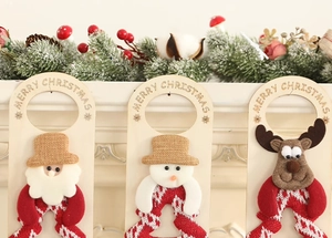 Detailed trio of Santa, Snowman and Reindeer wooden door hangers with Merry Christmas text
