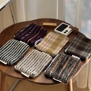 Set of six colorful tweed plaid mini pouches with zippers and wristlet straps