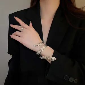 Irregular silver snake-shaped open bracelet and ring set for women with high-polish finish