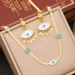 Golden evil eye necklace and earring set with snake chain and disc pendants