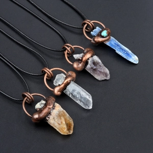 Four vintage natural crystal necklaces with raw stones and hand-wrapped copper wire