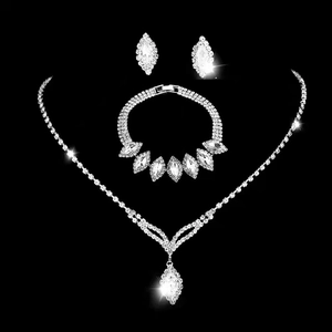 Elegant bridal silver rhinestone jewelry set including necklace, bracelet and earrings