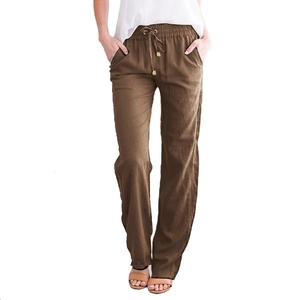 Détail du pantalon large en coton lin marron avec taille élastique à cordon et poches