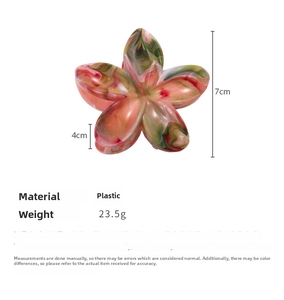 Detailed view of flower hair claw clip with pink and green marble texture and 7cm height