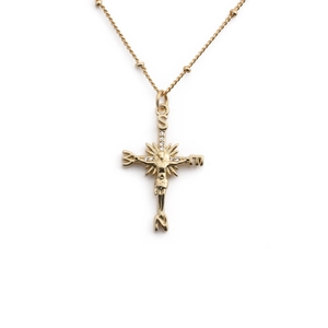 Elegant gold-plated copper cross necklace for women featuring compass points and embossed detail
