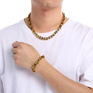 Detailed view of golden hip hop hollow bamboo link chain necklace and bracelet set